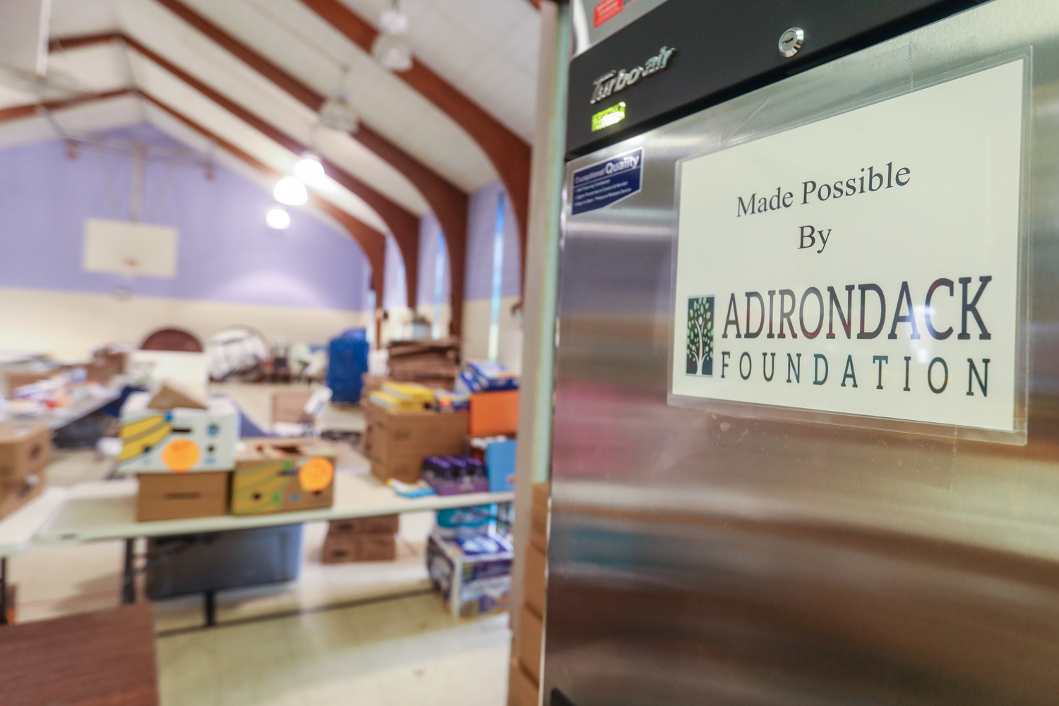 Refrigerator with made possible by Adirondack Foundation label on it