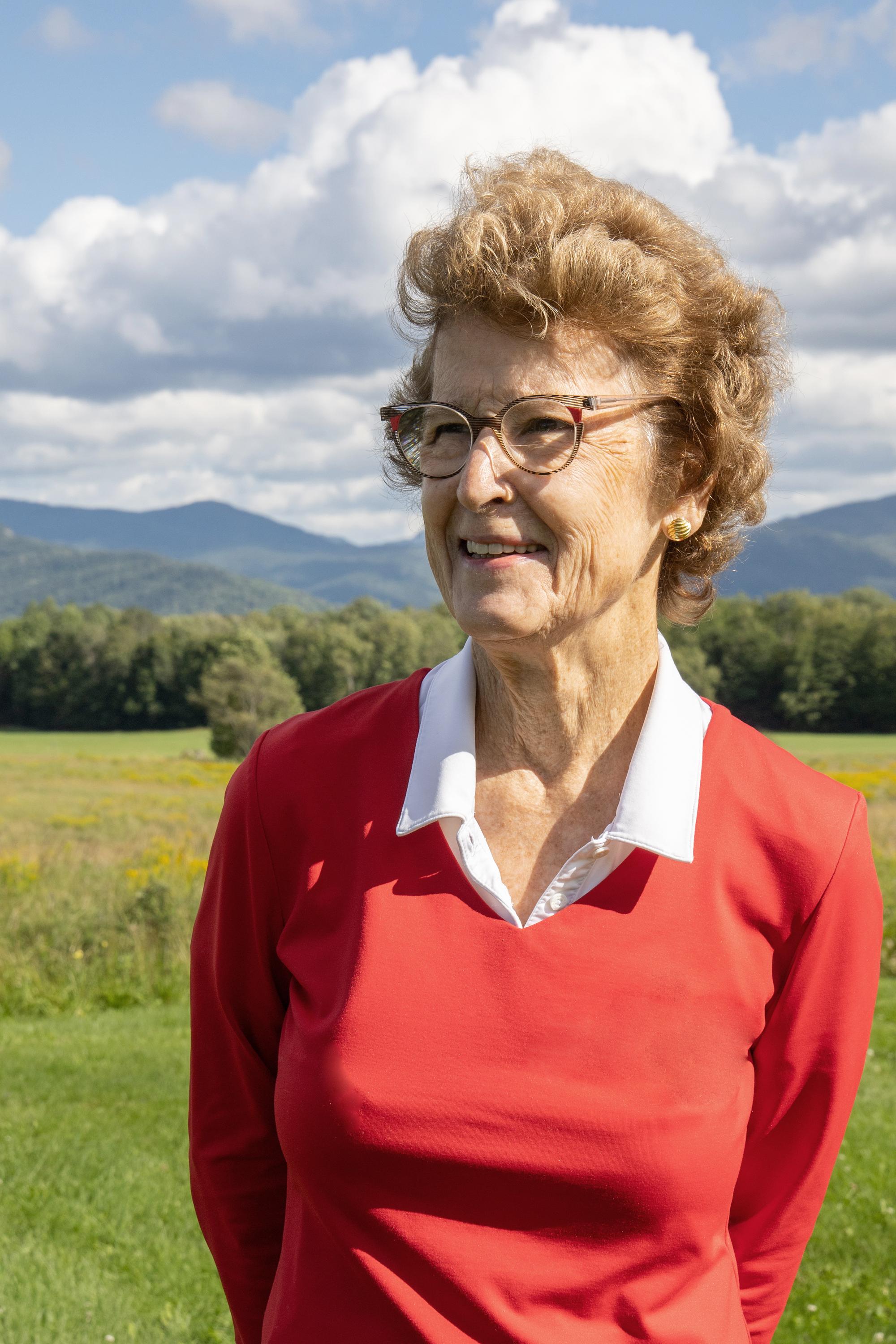 woman in front of mountain view