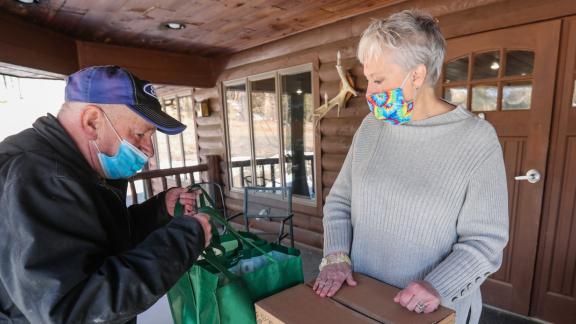 A man visits North Country Ministry's food pantry at the YMCA Adirondack Center