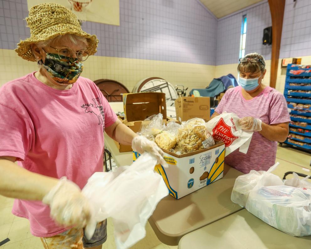 Volunteers packing food at the Salvation Army of Plattsburgh